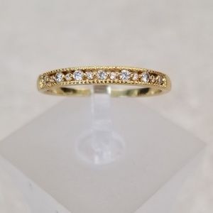 Delicate 18k Channel Set Band